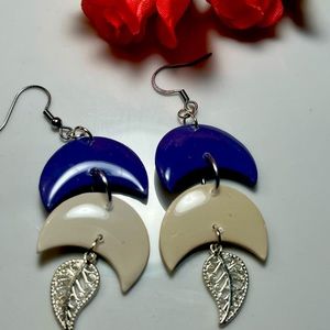 Lightweight earrings made by me.